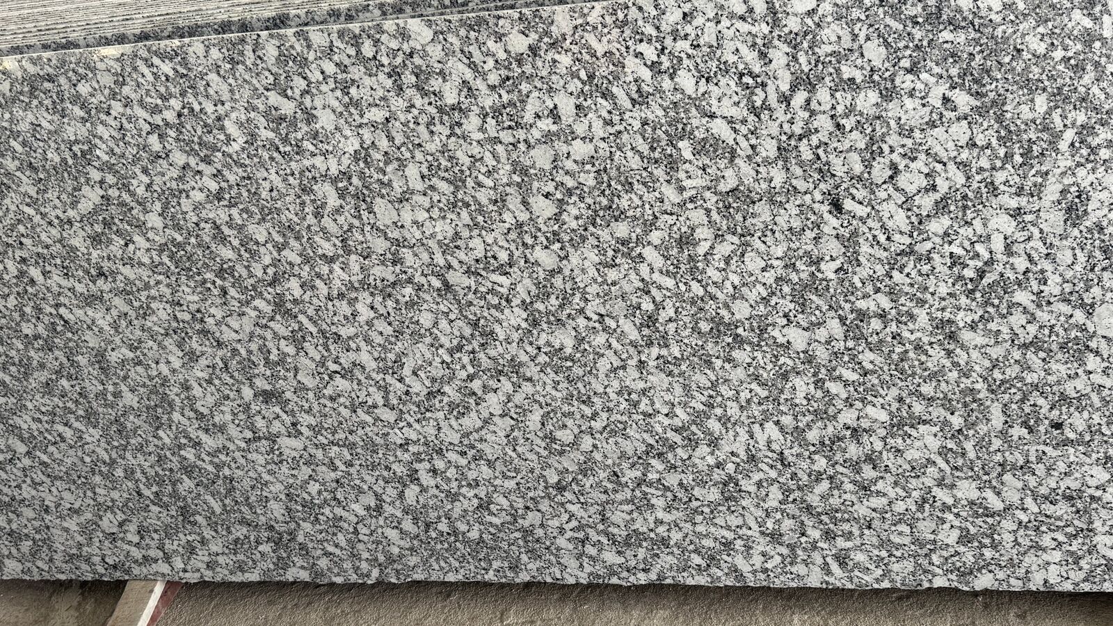Crystal White polished granite slab