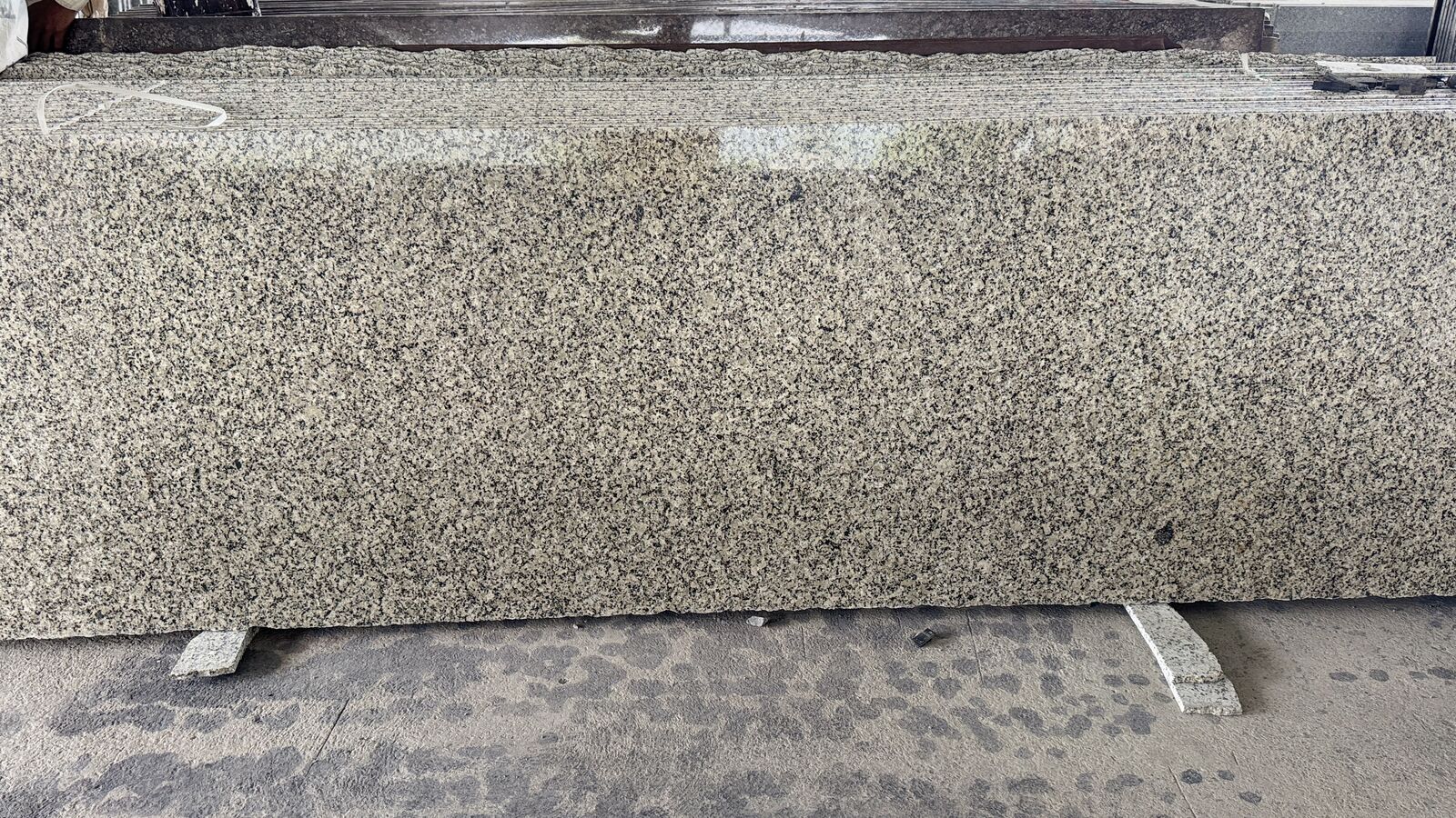 Ivory Brown polished granite slab