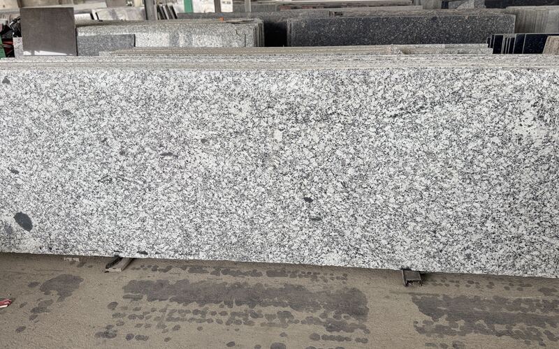 Moon White polished granite slab