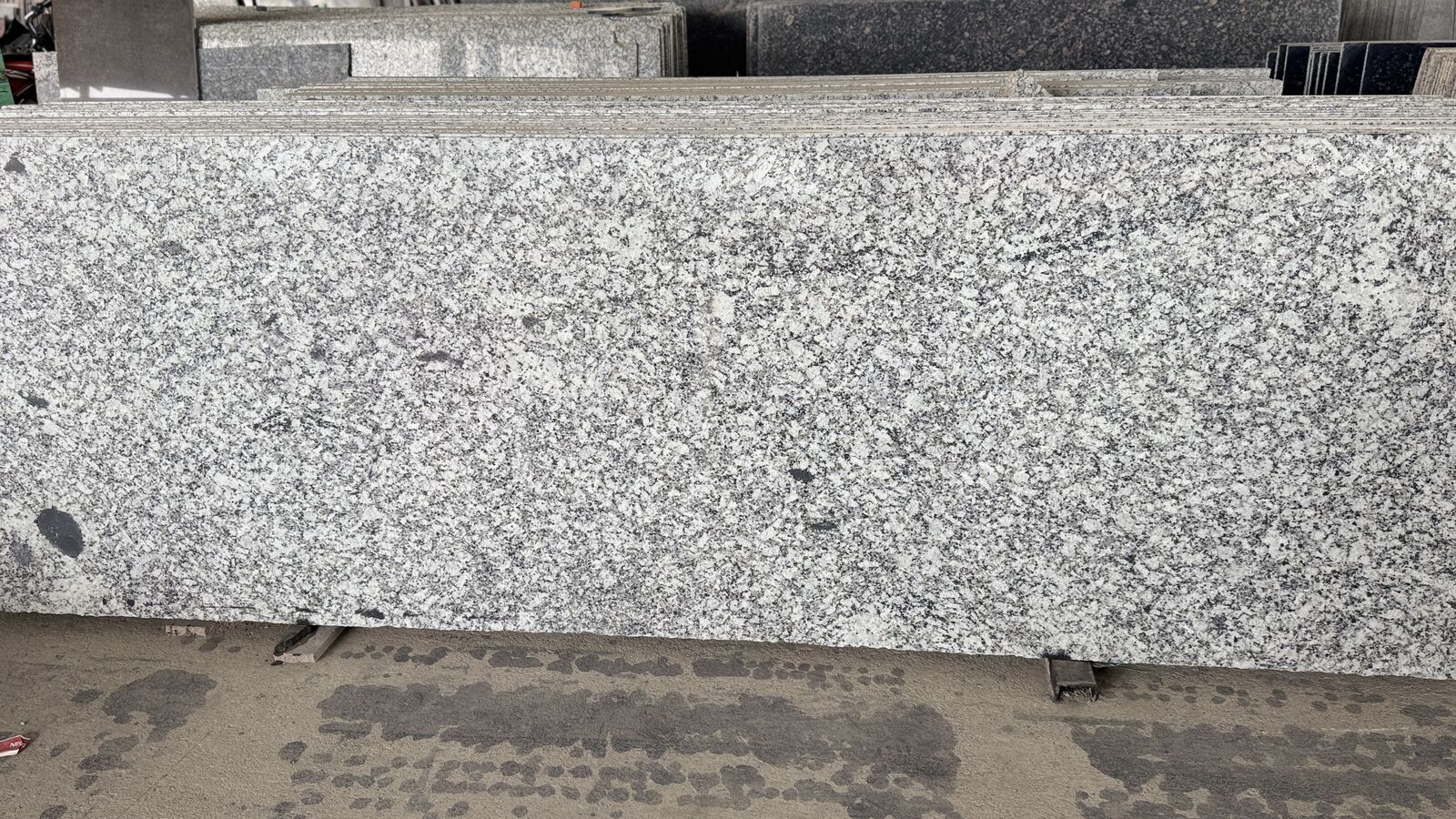 Moon White polished granite slab